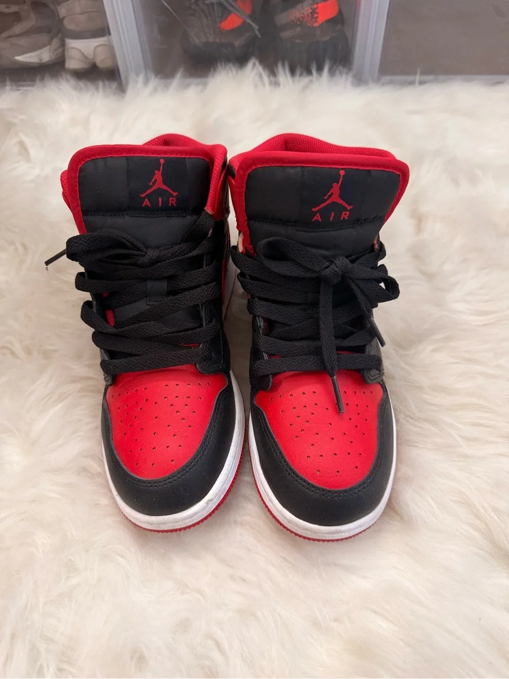 Jordan 1 Black and Red Mid-Top Sneakers